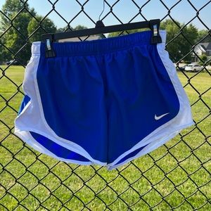 Nike blue running shorts size medium.